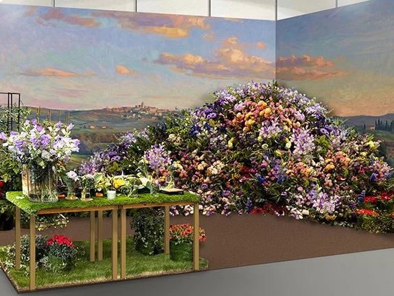 色とりどりの花々が山のように積み重ねられた華やかな屋内フラワーディスプレイ